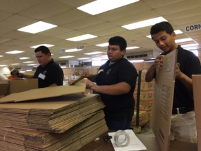 KIPP students preparing disaster relief boxes