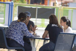 Interviewing community members for the assessment.