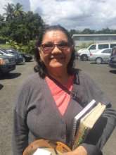 Juanita, participant from Bayamon, left smiling