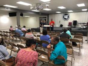 Staff meeting with Pastor Miguel's community