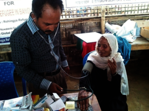 Doctor is attending a patient