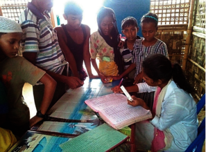 Health worker keeping record