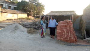 Apne Aap staff delivers Construction Material
