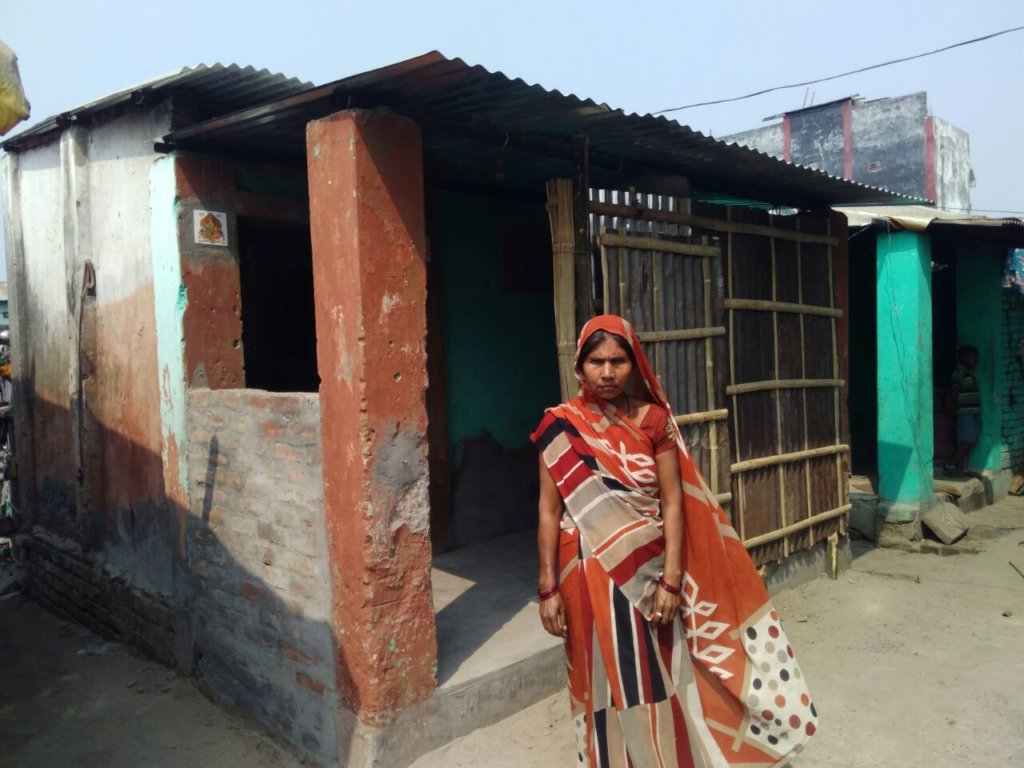 A woman outside her home in Forbesganj