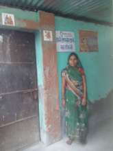 Sarita Devi- In front of her house