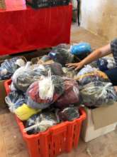 Clothes packs prepared for new arrivals on Lesvos