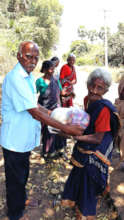 Neglected elder eagerly receiving food groceries