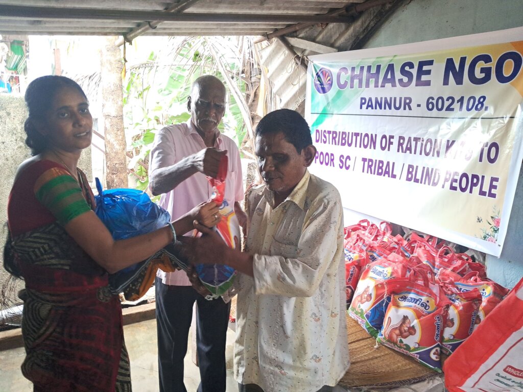 Blind people receiving food groceries