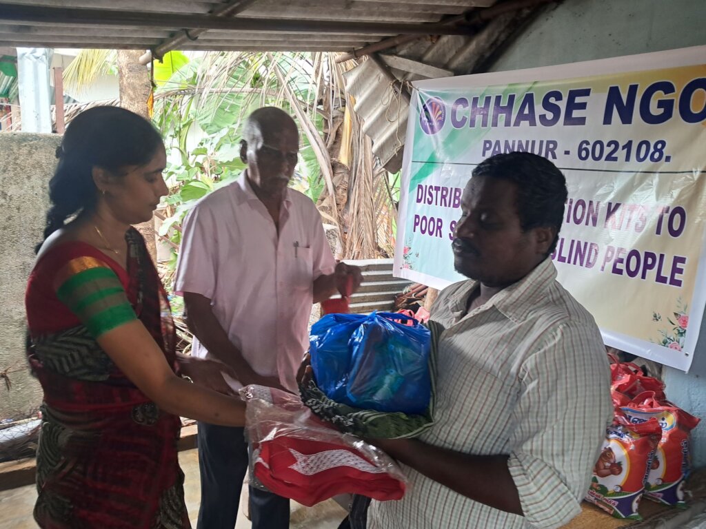 Blind people receiving food groceries