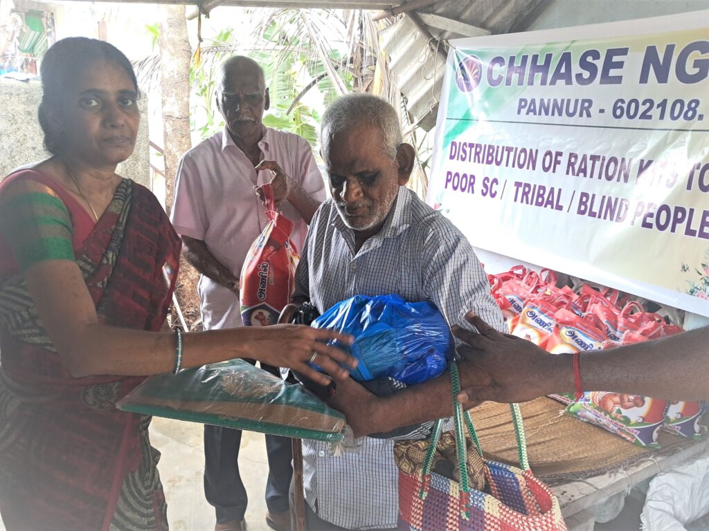 Blind people receiving food groceries