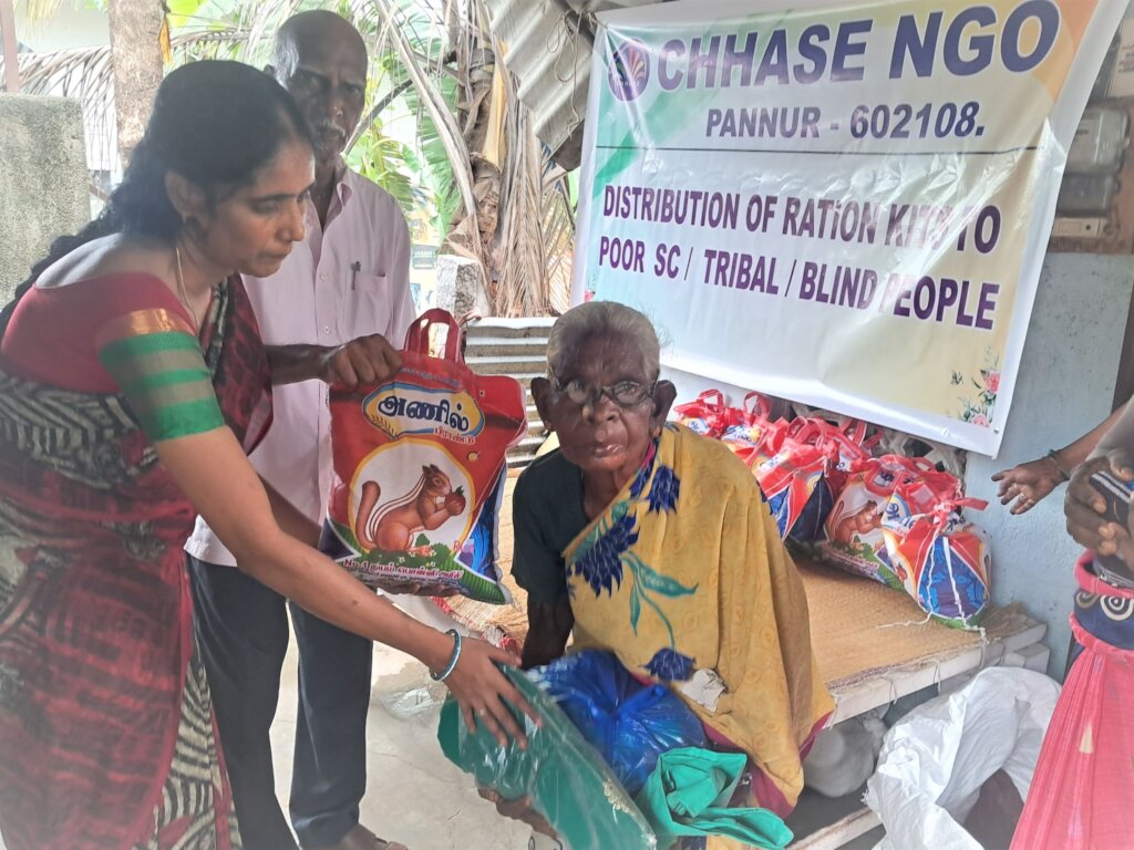 Blind people receiving food groceries