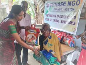 Blind people receiving food groceries