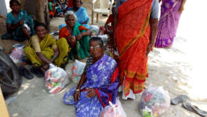 Destitute elders receiving food groceries