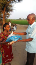 Blind girl receive food groceries and bed sheets