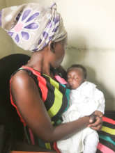 Immaculate with her HIV-negative baby