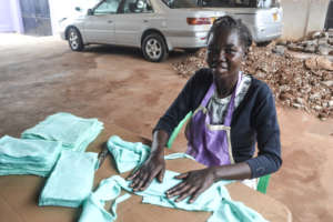Comfort sews reusable sanitary pads at AMS.