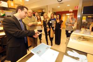 Dr Vassilopoulos giving donors a lab tour