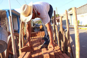 Getting bricks for building the base for comical