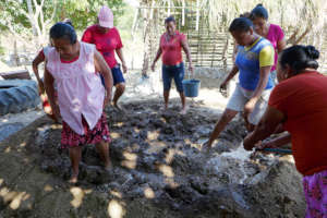 Preparing the mud for walls