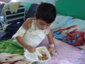 Child eating one of our delicious meals