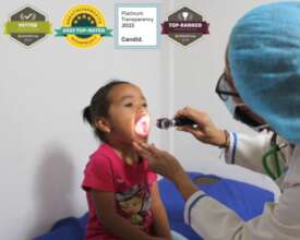 Little girl receiving medical care by the doctor