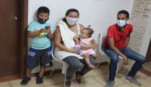 A family waiting to see the doctors