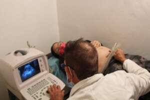 Mother Receiving an Ultrasound Examination