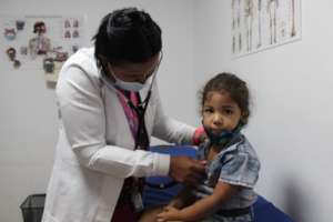 Venezuelan girl receiving a medical checkup