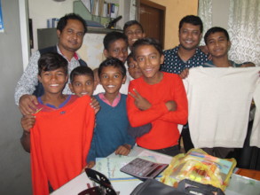 Street children happy getting donated sweaters