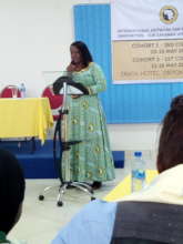 Confidently presenting about her INELI journey