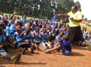 Gladys engaging the pupils on the effects of FGM