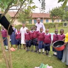 Students in new uniform, shoe and the headteacher