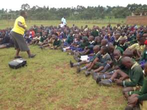 Staff Explaining details on FGM and involving pupi