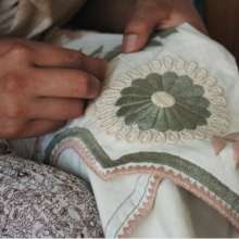 embroidering by hand in aguacatenango