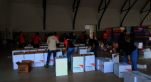 Staff prepare relief supplies for distribution