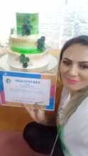 Iranilda with her program certificate