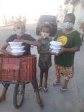 A family receiving meals
