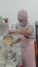 Mairla working hard making treats in the kitchen