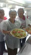 Students Showing Off Their Pizzas