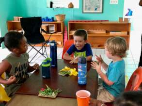 Friends sharing a joke during Gratitude Feast