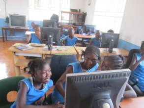 FAWE Girls working in the Computer Lab