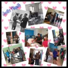Employees & volunteers give food to participants