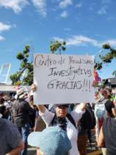 A demonstrator at a march thanks the CPI