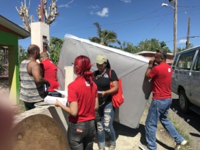 Volunteers dispatch furniture to community members