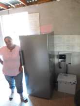 Solar-powered fridge installation by Casa Pueblo
