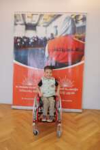 Mohammed after receiving his new wheelchair