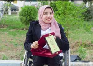 Heba with her honorary prize from her university