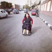 Rasha in her wheelchair