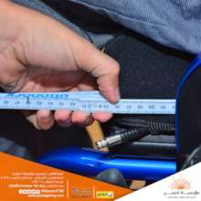 Taking the person's measurements for fitting