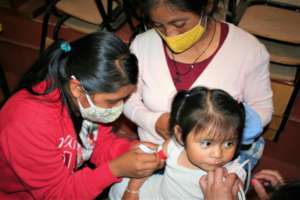 Promotors measure child growth